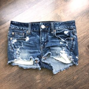 Distressed denim shorts